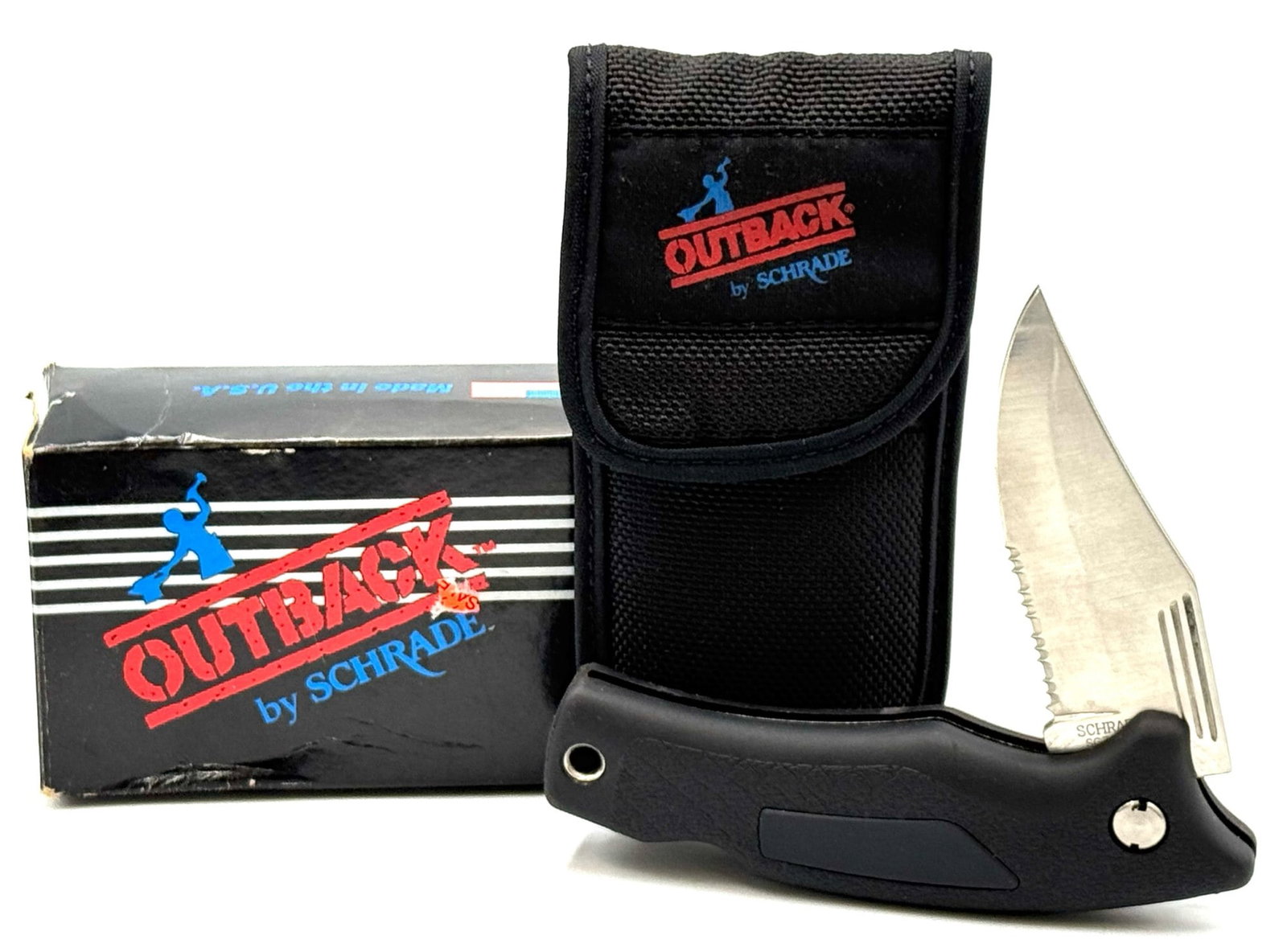 Schrade USA SG7S Outback Serrated Knife in Box NOS: Schrade USA SG7S Outback Serrated Knife in Box NOS. Knife measures 8 1/4 inches in length, box contains the original nylon sheath. This folding knife is in new condition and has been taken care of. Sc