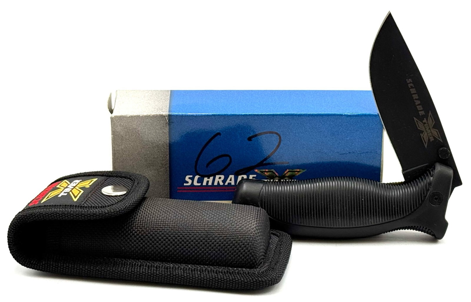 Schrade Xtimer XT7B tactical Folding Knife NIB: Schrade Xtimer XT7B Tactical Folding? Knife NIB.? Knife measures 9 inches in length, box contains black nylon sheath and paperwork.? Great reviews with a quality name.? Knife was made in the old Schra