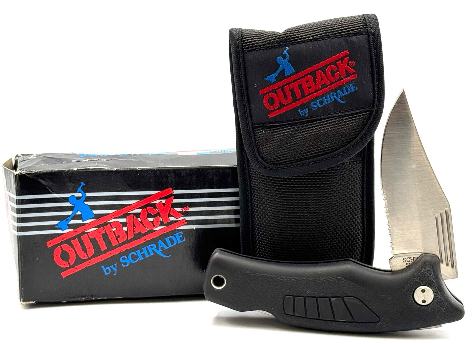 Schrade USA SG7S Outback Serrated Knife, NOS: Schrade USA SG7S Outback Serrated Knife, NOS.? The Schrade SG7S is new and in the original box.? Box contains paperwork and the original black nylon sheath.? Knife measures 8 1/4 inches in length.? A 