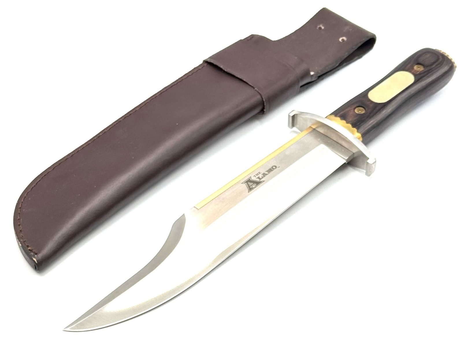 The Alamo 17.25in Long Fixed Blade Bowie Hunting Knife with Sheath: The Alamo 17.25in Long Fixed Blade Bowie Hunting Knife with Sheath.? Blade is marked The Alamo TM & 1960-2009 MGM.? Blade measures 11.5in long with an overall length of 17.25in long.? Leather Sheath