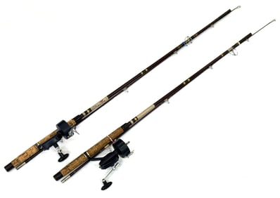 Two Mitchell 510 Fork Claw Spinning Reels on Garcia Fishing Rods