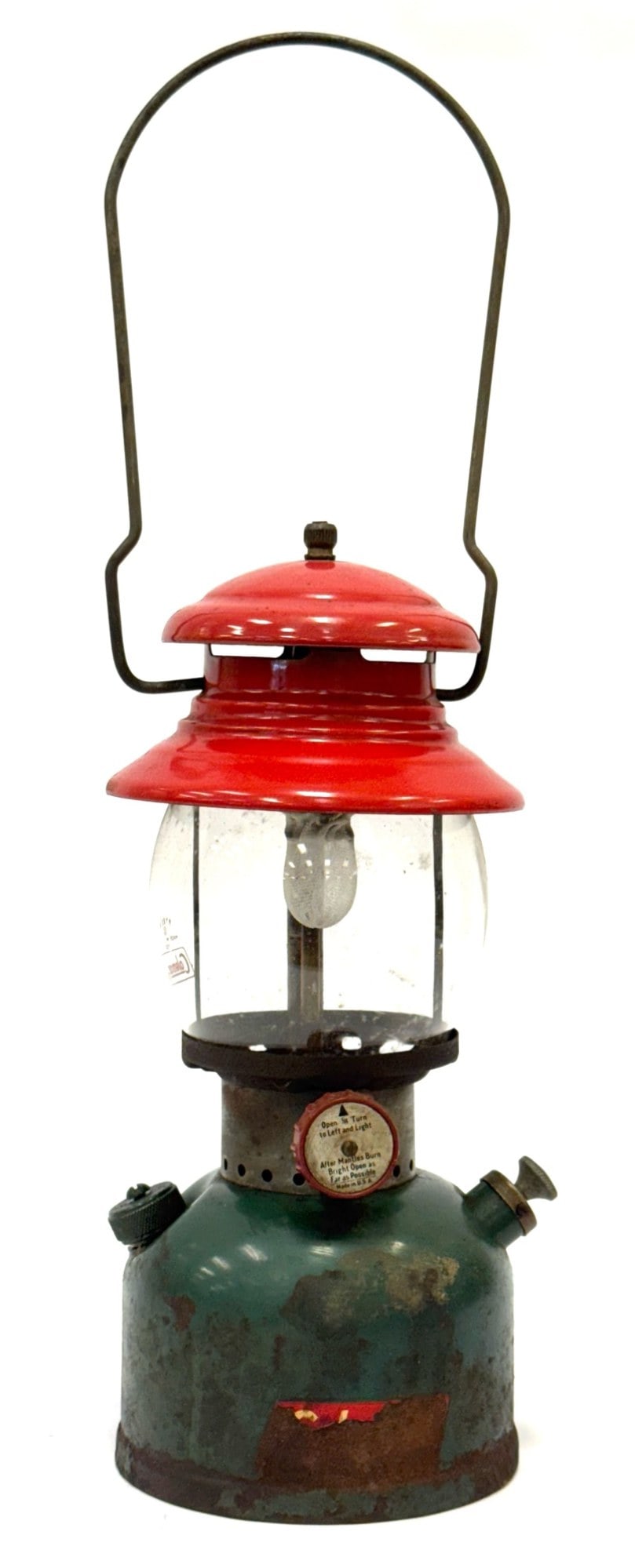 1951 Coleman Model 200A Christmas Two Mantle Lantern: 1951 Coleman Model 200A Christmas Two Mantle Lantern.? This lantern does have some porcelain chipping on the red mantle with some surface rust.? Green base has some wear and surface rust due to age an