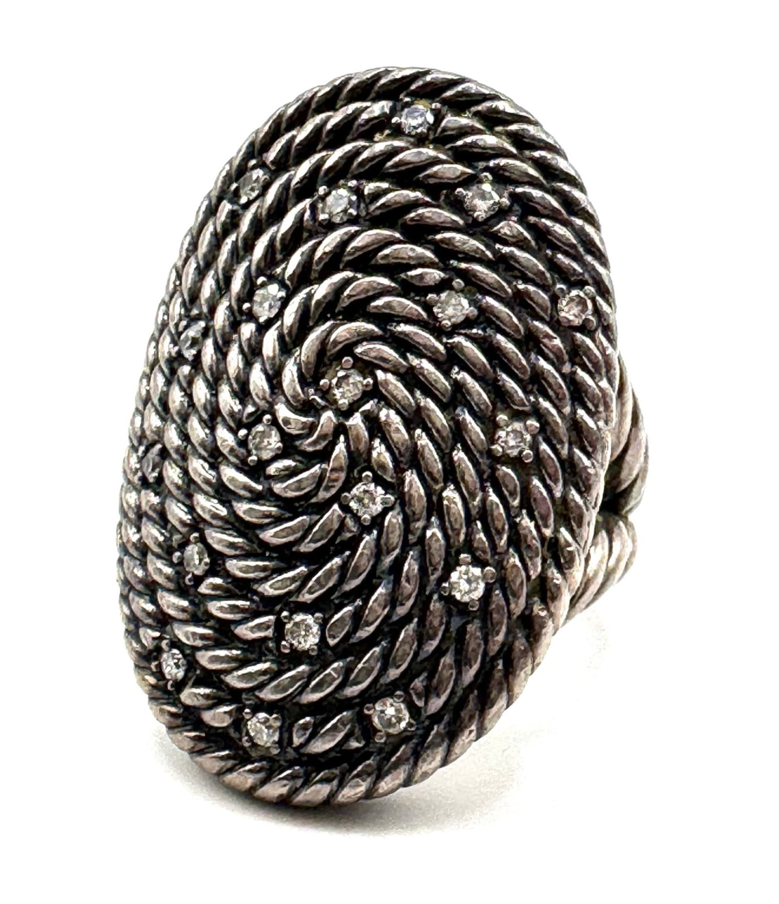 David Yurman Sterling & Diamond Cable Coil Ring: David Yurman Sterling & Diamond Cable Coil Ring Size 6.? This ring contains a total of 19 small round diamonds with a total of .23ct.? This beautiful ring has a total weight of 25.69g