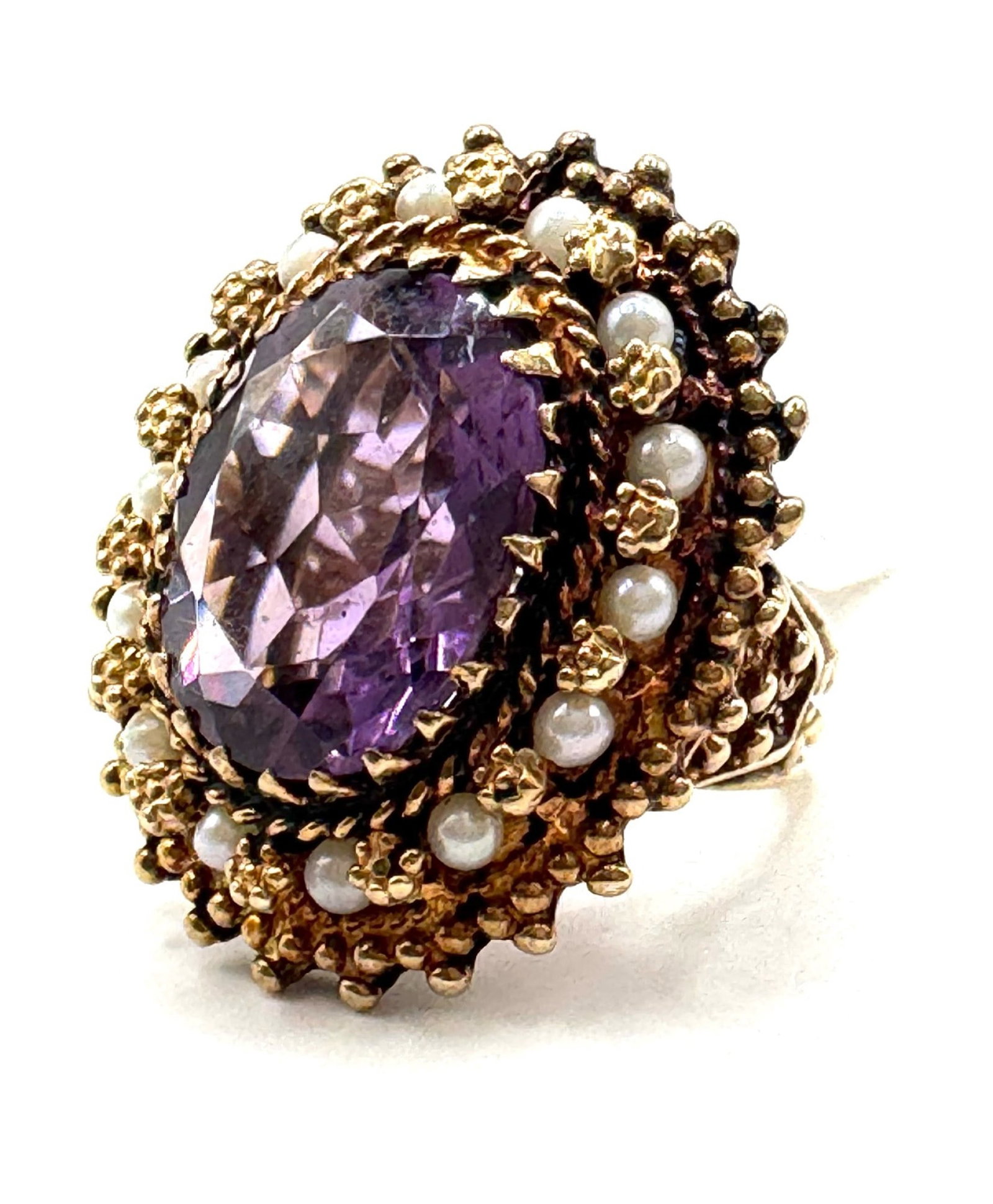14K Yellow Gold Amethyst & Pearl Estate Ring: 14K Yellow Gold Amethyst & Pearl Estate Ring Size 6.? This ring has one large oval Amethyst Center Stone, and 14 small pearls beautifully placed in this victorian style filigree estate ring.? Total we