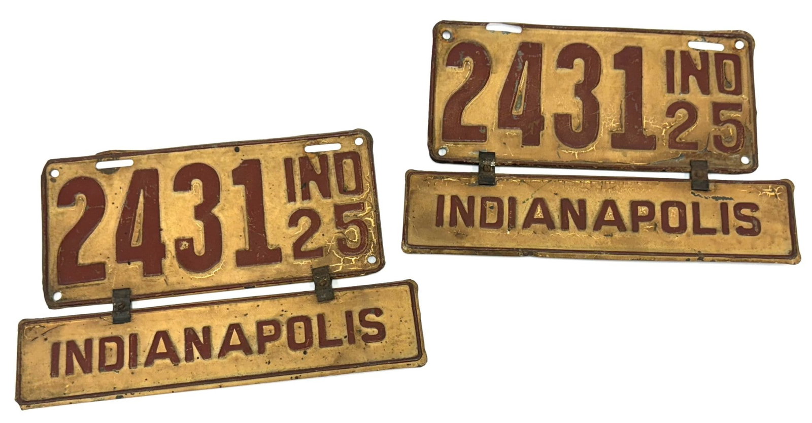 (2) 1925 Indiana Matching Number License Plates, with Indianapolis Tag/Plate: (2) 1925 Indiana Matching Number License Plates, with Indianapolis Tag/Plate.? Overall Plates measures approximately 12in x 8in