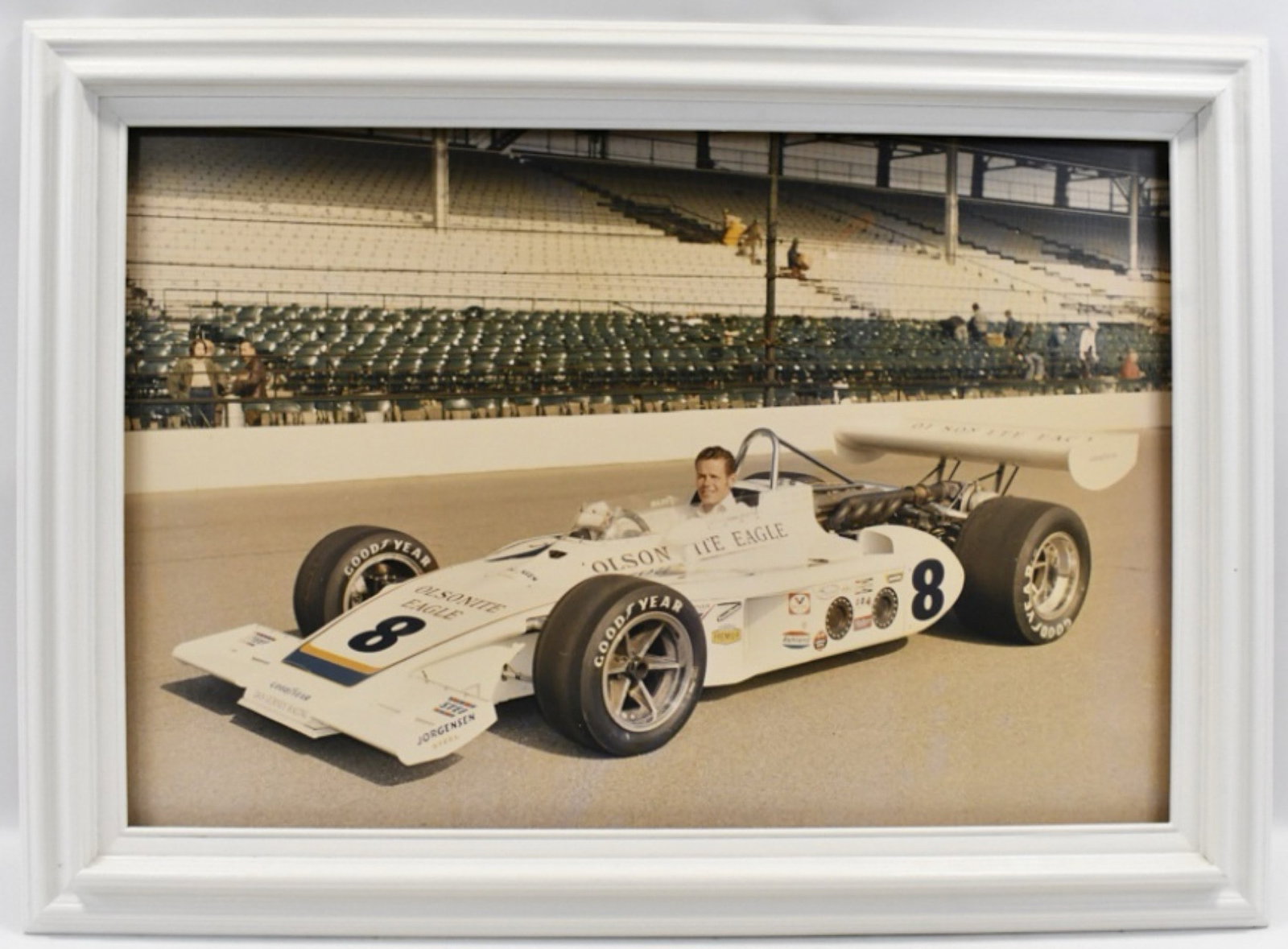 1973 Indy 500 #8 Olsonite Eagle Qualifying Photo Framed: 1973 Indy 500 #8 Olsonite Eagle Qualifying Photo framed. From the Private Collection of Bobby Unser. The frame measures approximately 43" across by 31" tall