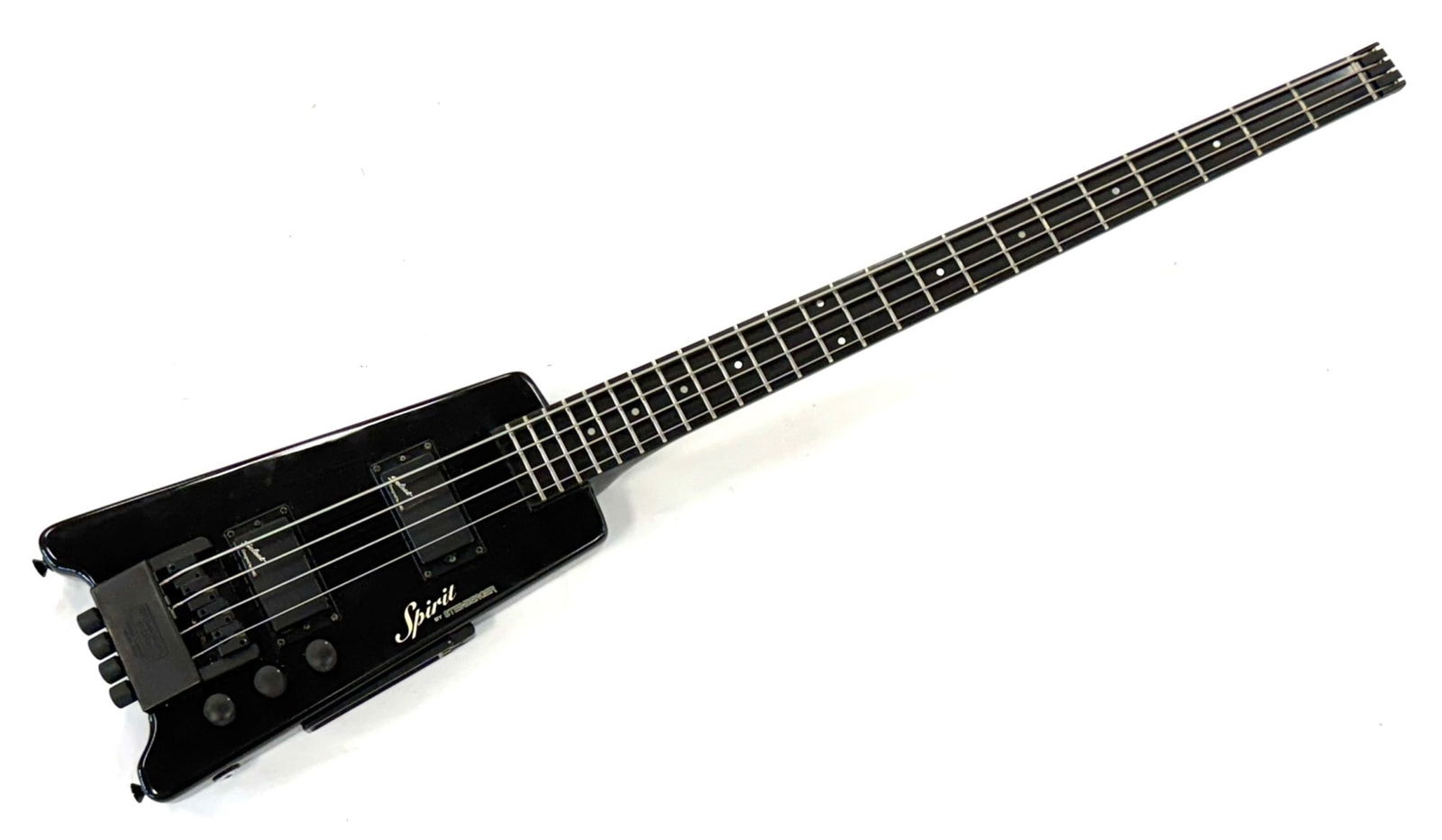 Steinberger Spirit XT-2 4-String Bass Guitar: Steinberger Spirit XT-2 4-String Bass Guitar. This black headless electric bass guitar is in nice used condition with some minor scratches. The bass has two Steinberger humbuckers to create powerful t