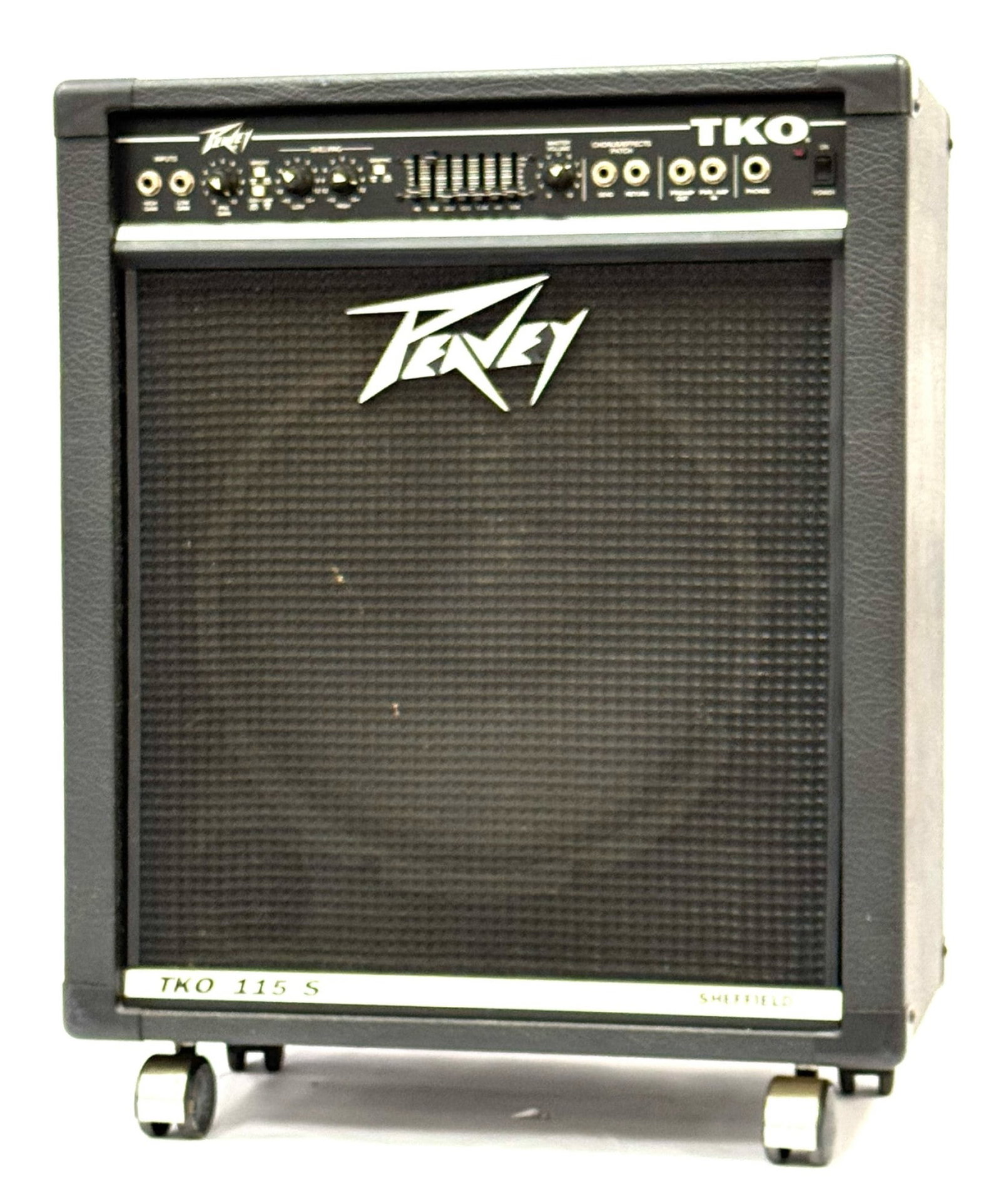 Peavey TKO 115S Bass Combo Amp: Peavey TKO 115S Bass Combo Amp. The TKO 115s is in good used condition and is in the color black. It measures approximately 28" tall x 22" wide. This is a rolling speaker, making it easy to move aroun