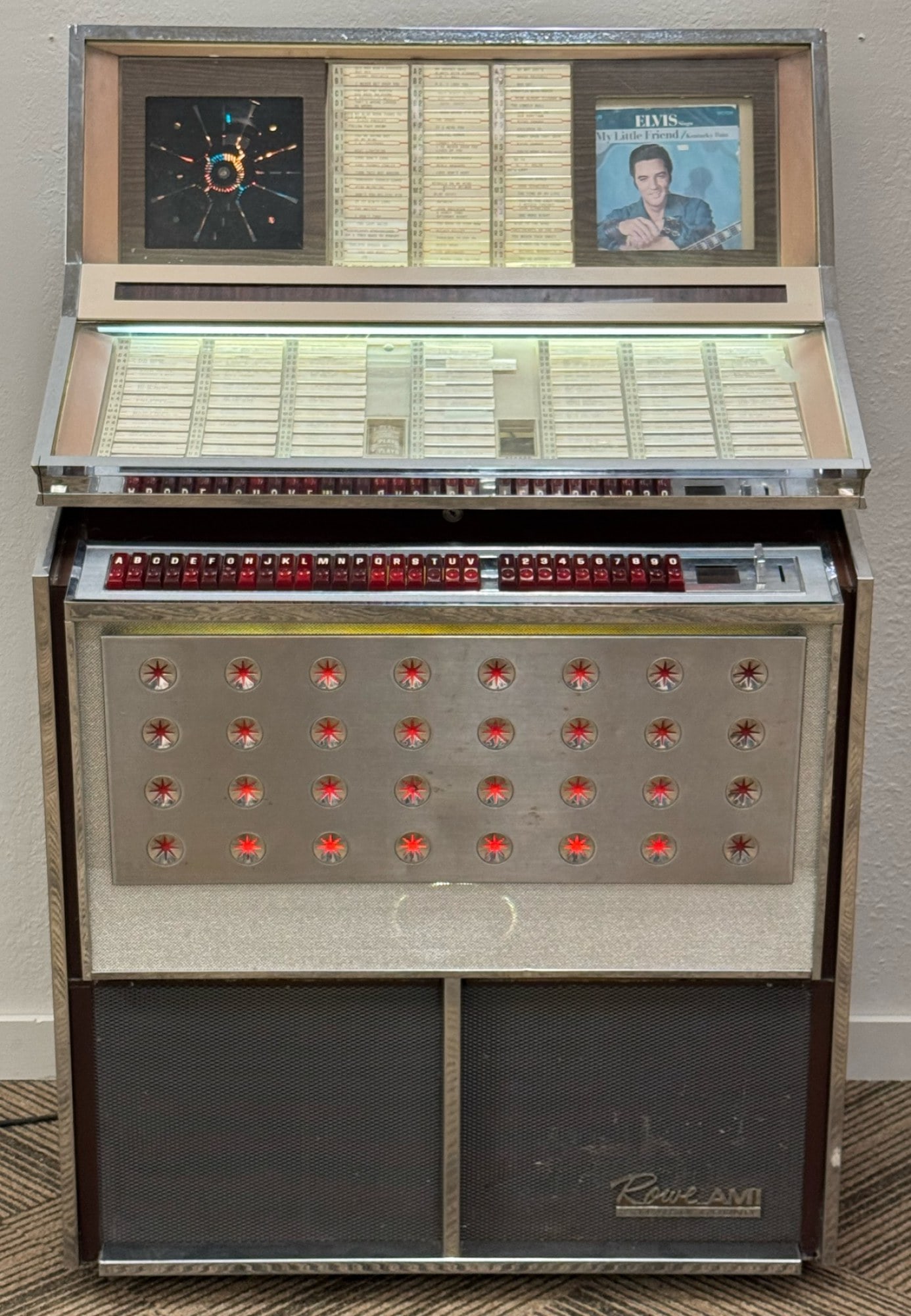 1960's Rowe AMI Model M JBM 200 "Tropicana" Jukebox: 1960's Rowe AMI Model M JBM 200 "Tropicana" Jukebox This Jukebox Was Manufactured Around1963, This Model Can Play 45 RPM Records With The Capacity Of 200 Selections, AMI Merged With Rowe In The 1960s