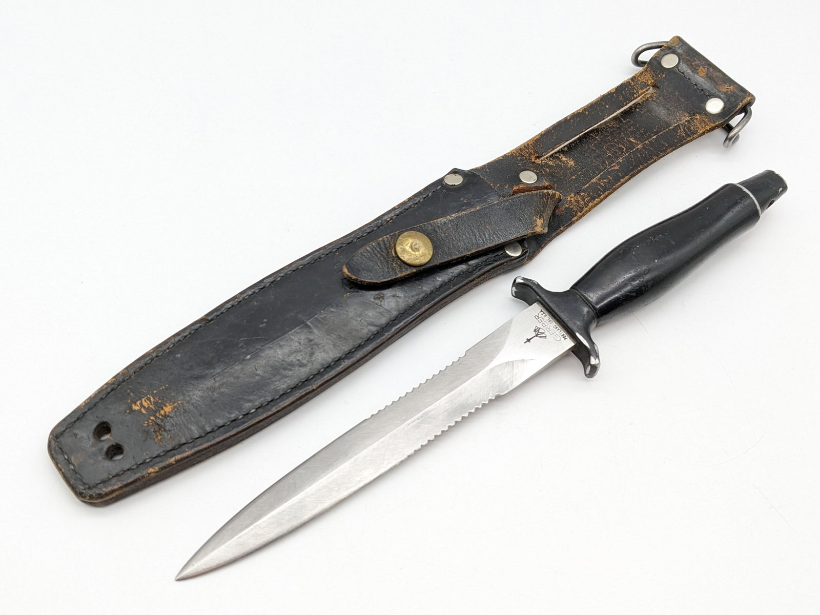 Vtg Gerber MK-II Wasp Fighting Knife w/ Sheath: Knife features a double edged blade with serrations towards the tang, blade is hand engraved with the name Leroy Spencer 1985, stamped with serial number B9892S, and a black painted aluminum handle. S