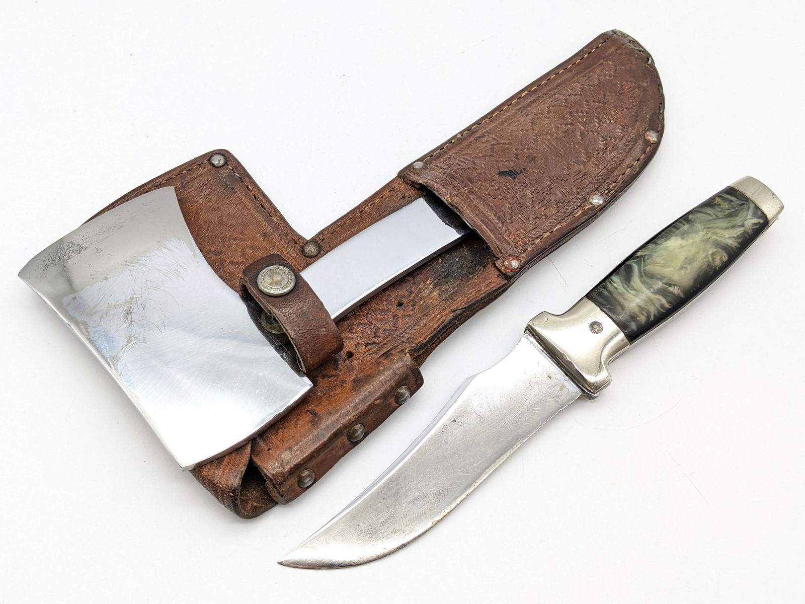 1932-40 Case XX Hunting Knife Hatchet Combination Set w/ Sheath: Set comes with both a knife blade and hatchet blade that are interchangeable with the handle. Features a clip point blade with thumb notches, marbled celluloid handle, and a flip out ruler. Set is in