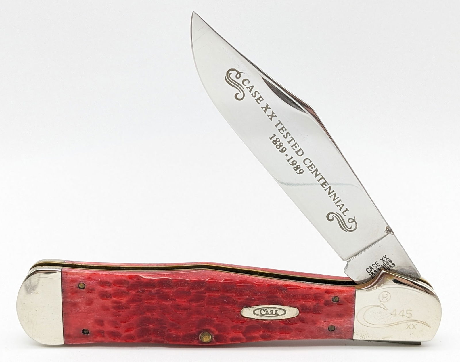 Ltd 1989 Case XX Centennial Red Bone Copperhead Large Coke Bottle RC61050: Ltd 1989 Case XX Centennial Red Bone Copperhead Coke Bottle RC61050. Knife is numbered 445 on the upper front bolster, and is in very nice condition with some tarnishing on the bolsters, and a carbon