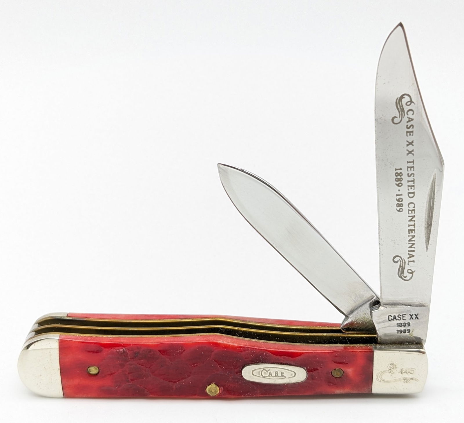Ltd 1989 Case XX Centennial Red Bone Small Coke Bottle R6225 1/2: Ltd 1989 Case XX Centennial Red Bone Small Coke Bottle R6225 1/2. Knife is numbered 445 on the upper front bolster, and is in like new condition. Overall measures in when closed.