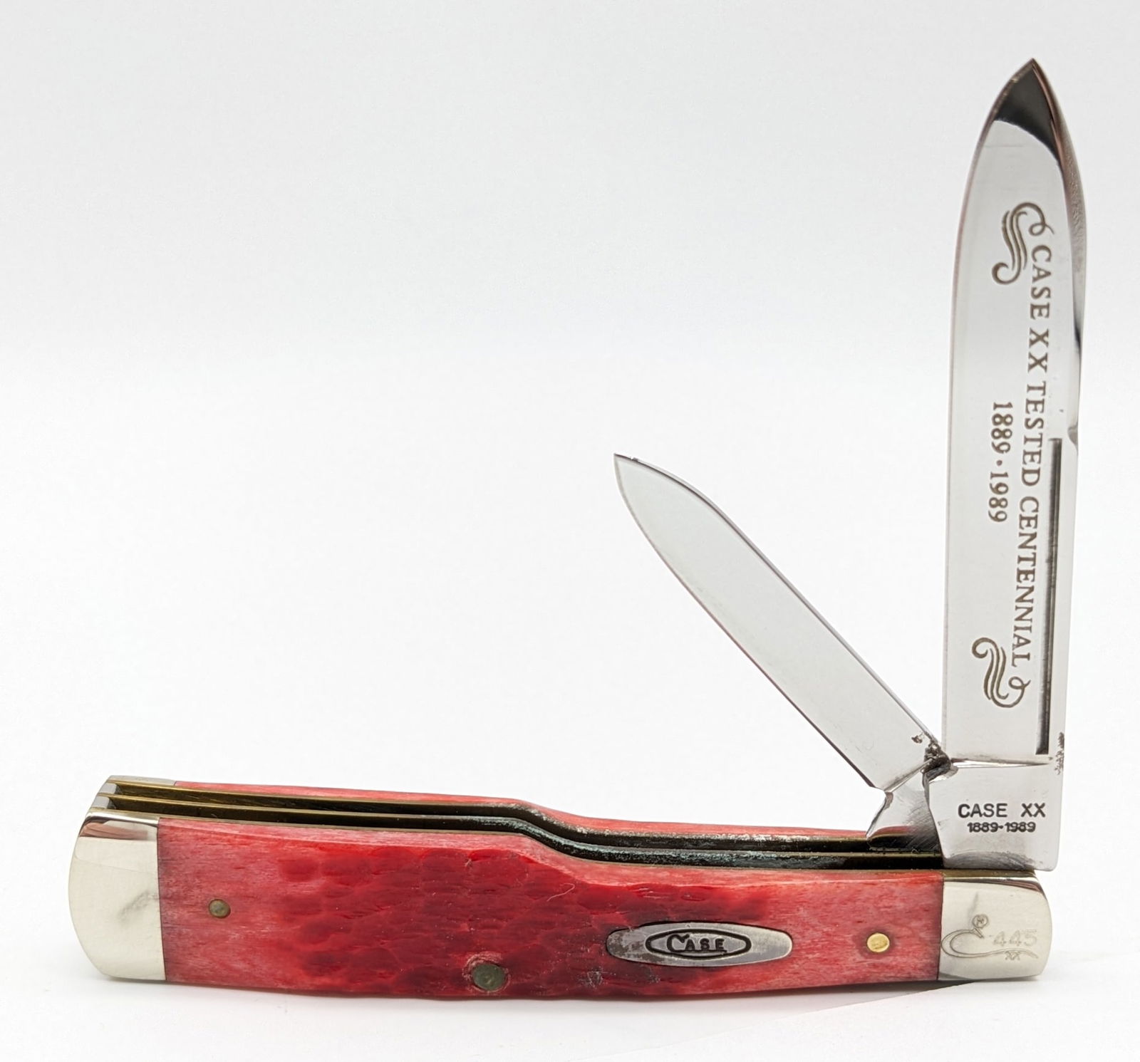 Ltd 1989 Case XX Centennial Red Bone Gunstock Jack Knife R6230: Ltd 1989 Case XX Centennial Red Bone Gunstock Jack Knife R6230. Knife is numbered 445 on the upper front bolster, and is in very nice condition with some carbon spots on the spines by the tang. Overal
