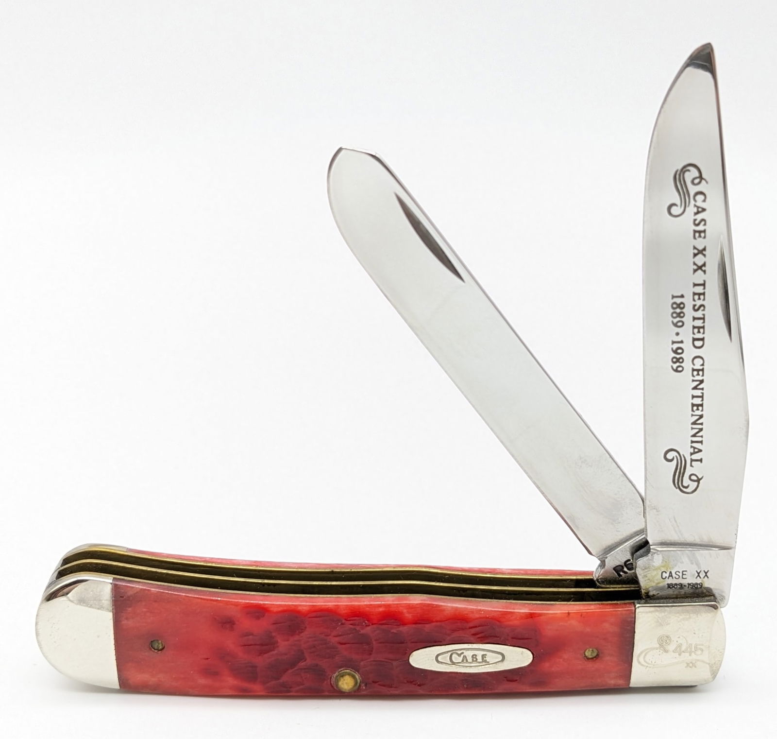Ltd 1989 Case XX Centennial Red Bone Trapper R6254: Ltd 1989 Case XX Centennial Red Bone Trapper R6254. Knife is numbered 445 on the upper front bolster, and is in like new condition. Overall measures 4-1/8in when closed.