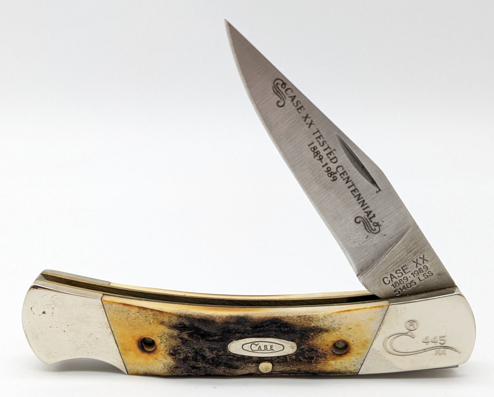 Ltd 1989 Case XX Centennial Stag Lockback Knife 51405: Ltd 1989 Case XX Centennial Stag Lockback Knife 51405. Knife is numbered 445 on the upper front bolster, and is in very nice condition with minimal tarnishing on the bolsters. Overall measures 3-3/4in