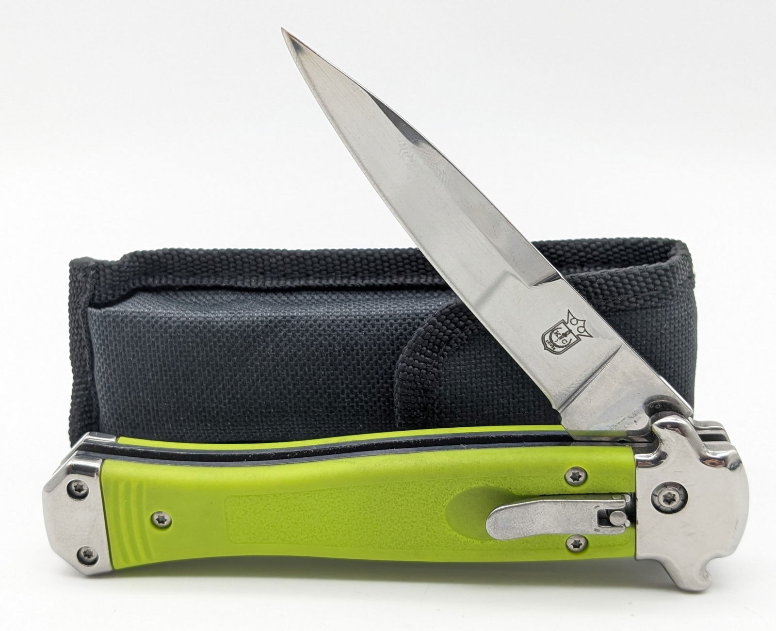 KC Knives Green Plastic Leverlock Switchblade Knife w/ Box & Sheath: Knife is in new condition. Overall measures 5in when closed.