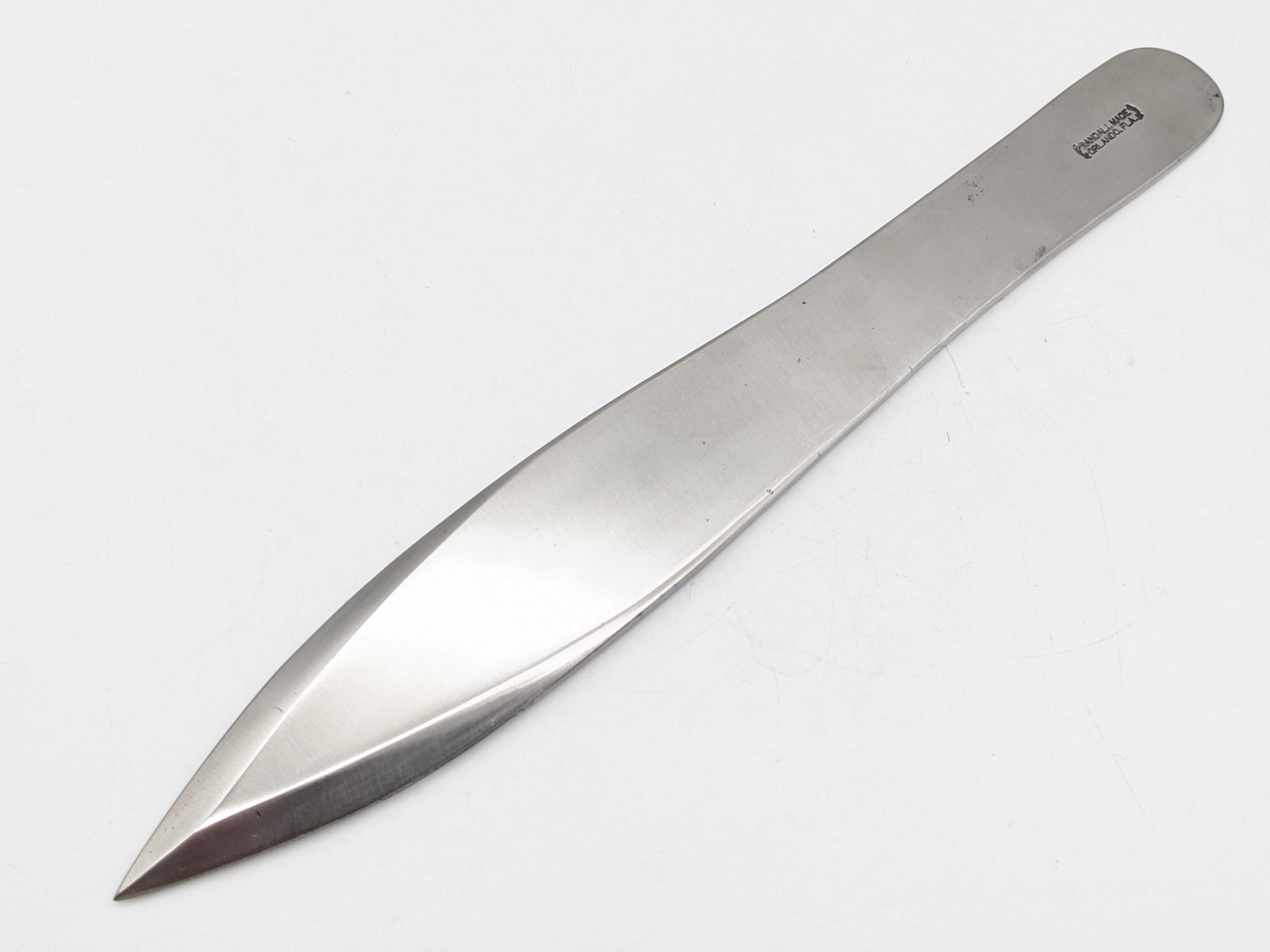 Randall Model 9 Pro Thrower Throwing Knife: Knife is in very nice condition with some scattered carbon spots and scuffs from handling and age. Knife is made from a solid piece of 1/4in stock that is well balanced and weighted. Overall measures 