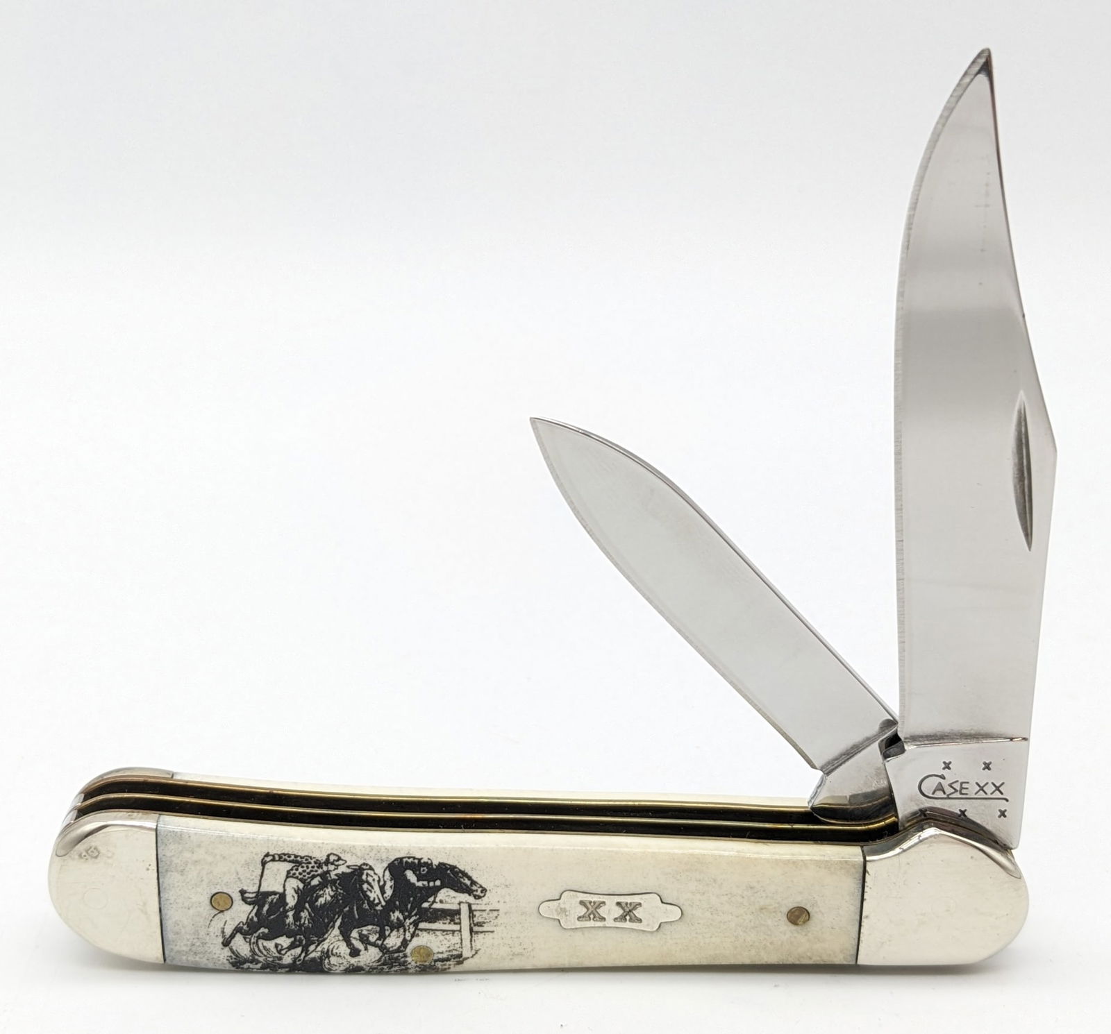 2005 Case XX Kentucky Derby Natural Bone Copperhead 6249: Knife is in very nice condition with light tarnishing and scuffs from handling. Overall measures 4in when closed.