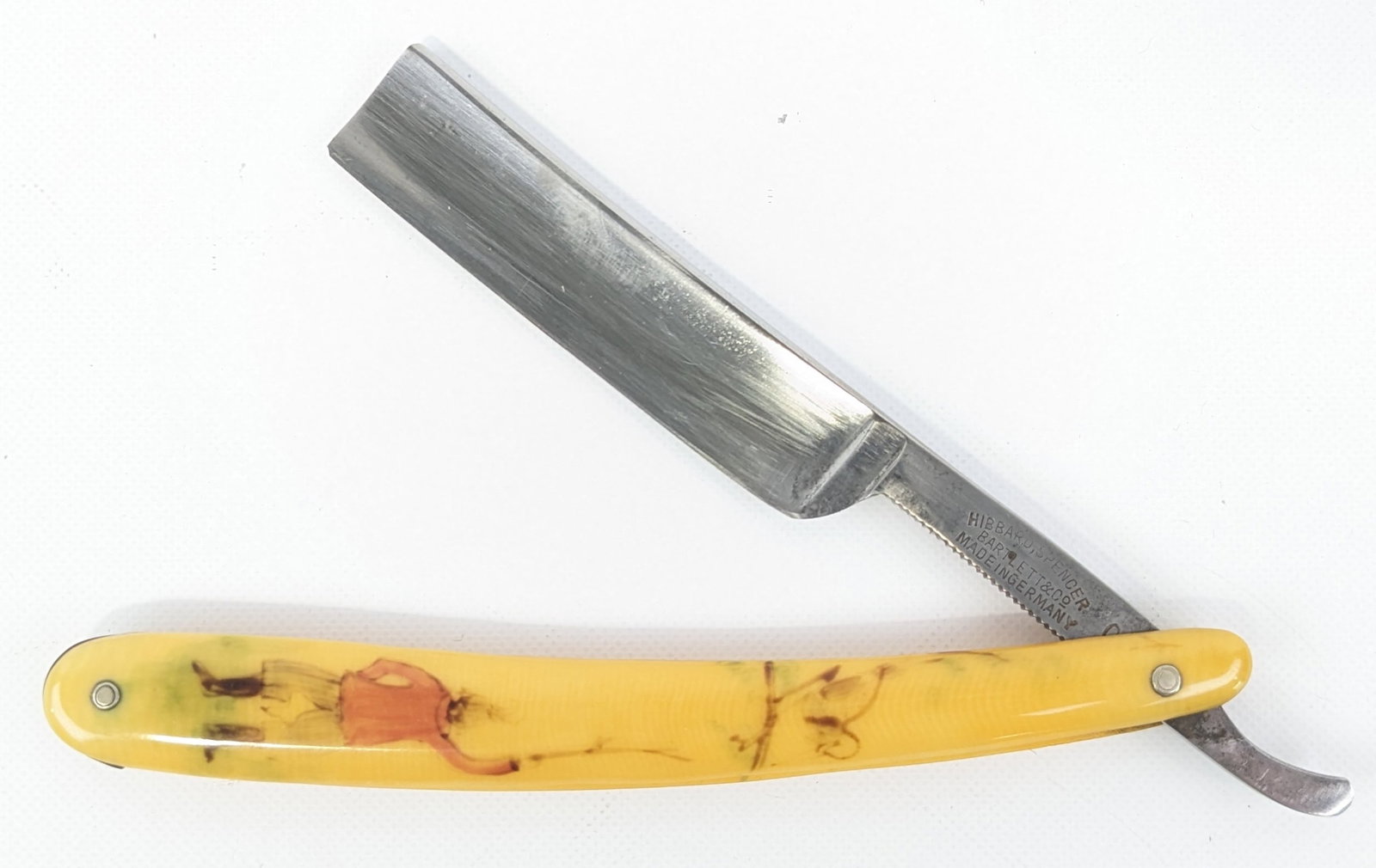 Hibbard Spencer Bartlett & Co. Model 1795 Celluloid Handle Straight Razor: Razor features a scene of a boy and his pet stuck in a tree. Razor is in nice condition with some carbon spots and scuffs from age and handling. Overall measures 6in when closed.