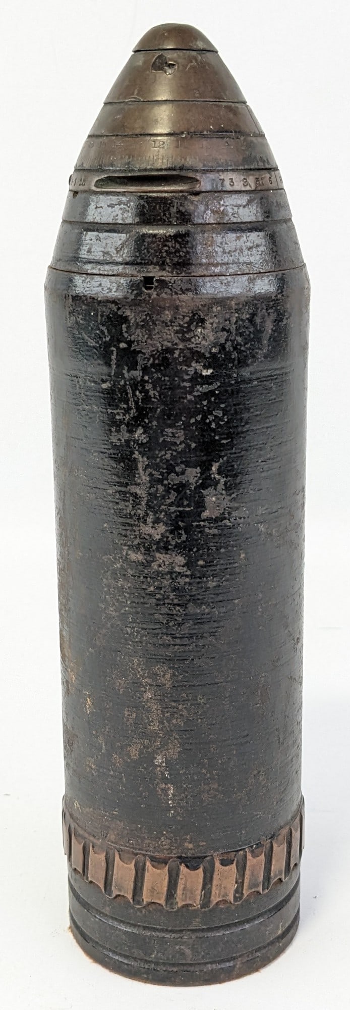 WWI US Army M1907 Scovill Inert 75mm Projectile: Features the adjustable brass fuse cap and rifling bands. Shell is in nice aged condition with scuffs and finish wear from age. Measures 11in tall.