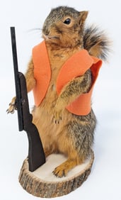 Squirrel with Vest and Hunting Rifle