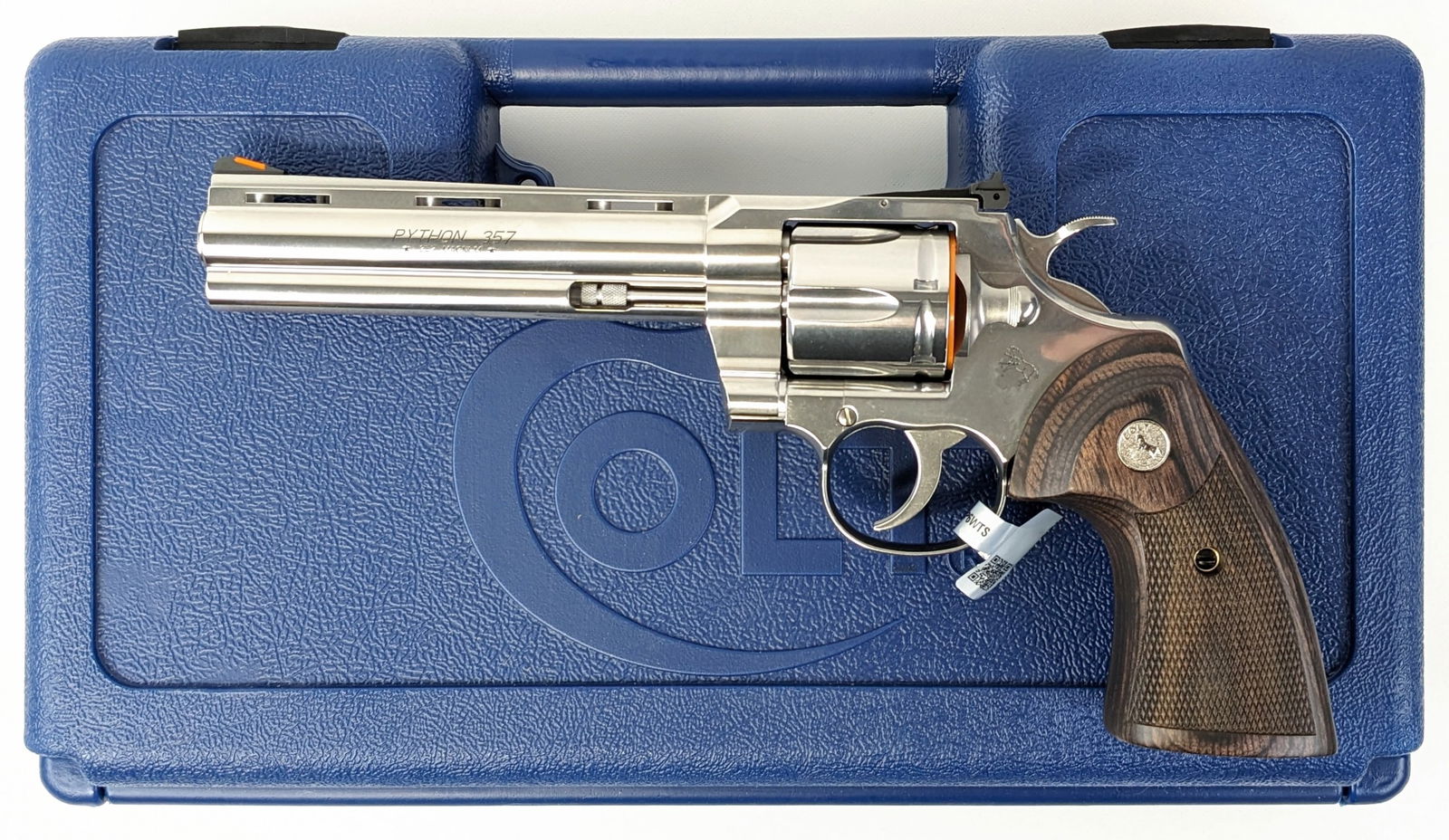 NIB Colt Python .357 Magnum Revolver: Manufacturer: Colt.Model: Python.Type: Revolver. Caliber/Gauge: .357 Mag. Barrel: 6 inch. Choke: . Finish: Polished Stainless. Grip: Checkered Wood. Stock: . Condition: New. FFL Transfer: Required. Se