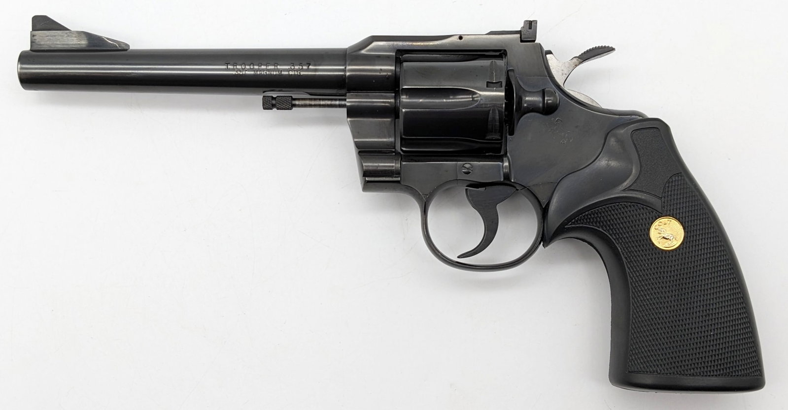 Colt Trooper .357 Magnum Revolver: Manufacturer: Colt.Model: Trooper.Type: Revolver. Caliber/Gauge: .357 Mag. Barrel: 6 inch. Choke: . Finish: Blued. Grip: Rubber. Stock: . Condition: Very nice with light wear from use and handling. Br
