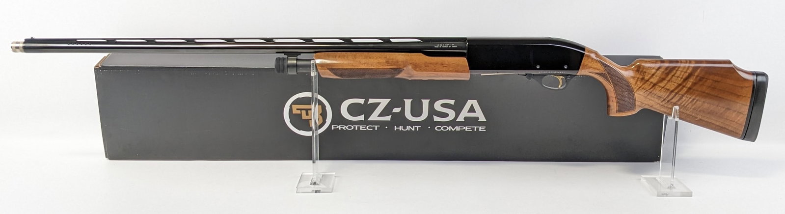 CZ Model 612 Target 12 Ga Pump Action Shotgun w/ Box: Manufacturer: CZ.Model: 612 Target.Type: Shotgun. Caliber/Gauge: 12 Ga. Barrel: 32 inch Ported. Choke: Screw In. Finish: Blued. Grip: . Stock: Walnut. Condition: Near new with minimal wear from use an