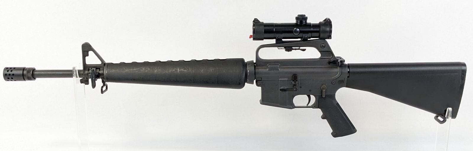 Colt AR-15 A2 Sporter II .223 Rem Semi Auto Rifle: Manufacturer: Colt.Model: AR-15 A2 Sporter II.Type: Rifle. Caliber/Gauge: .223 Rem. Barrel: 19 inch. Choke: . Finish: Black. Grip: . Stock: Composite. Condition: Very nice with light wear from use and