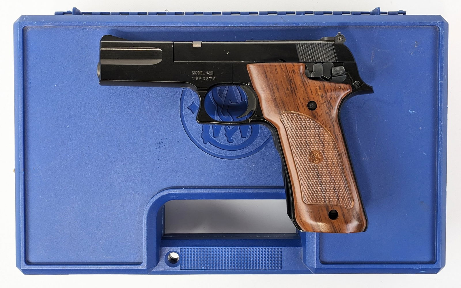 Smith & Wesson Model 422 .22 LR Semi Auto Pistol w/ Case: Manufacturer: Smith & Wesson.Model: 422.Type: Pistol. Caliber/Gauge: .22 LR. Barrel: 4-1/2 inch. Choke: . Finish: Black. Grip: Plastic. Stock: . Condition: Nice with light scuffs and wear from use and
