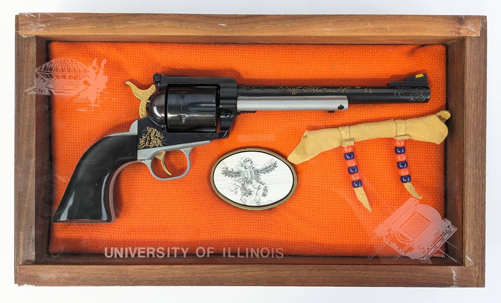 1982 Ruger Chief Illiniwek New Model Blackhawk .30 Carbine Revolver w/ Display: Manufacturer: Ruger.Model: New Model Blackhawk.Type: Revolver. Caliber/Gauge: .30 Carbine. Barrel: 7-1/2 inch. Choke: . Finish: Blued. Grip: Plastic. Stock: . Condition: Very nice with light wear from