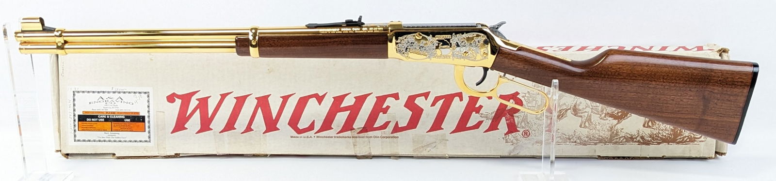 Winchester Model 94 AE A&A Engraving Chaffee County .30-30 Lever Action Rifle w/ Box: Manufacturer: Winchester.Model: 94AE.Type: Rifle. Caliber/Gauge: .30-30 Win. Barrel: 20 inch. Choke: . Finish: Gold. Grip: . Stock: Walnut. Condition: New. FFL Transfer: Required. Serial Number: 61030