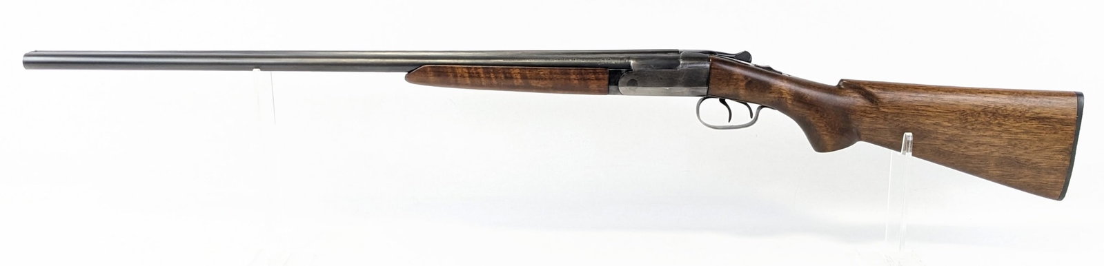 Winchester Model 24 16 Ga SxS Shotgun: Manufacturer: Winchester.Model: 24.Type: Shotgun. Caliber/Gauge: 16 Ga. Barrel: 28 inch. Choke: Right Modified - Left Full. Finish: Worn Blued. Grip: . Stock: Wood. Condition: Nice with light scuffs a