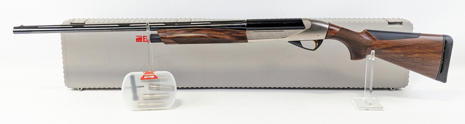 Benelli Ethos 28 Ga Semi Auto Shotgun w/ Case: Manufacturer: Benelli.Model: Ethos.Type: Shotgun. Caliber/Gauge: 28 Ga. Barrel: 26 inch. Choke: Screw In. Finish: Blued & Nickel. Grip: . Stock: Checkered Satin Walnut. Condition: Like new. FFL Transf
