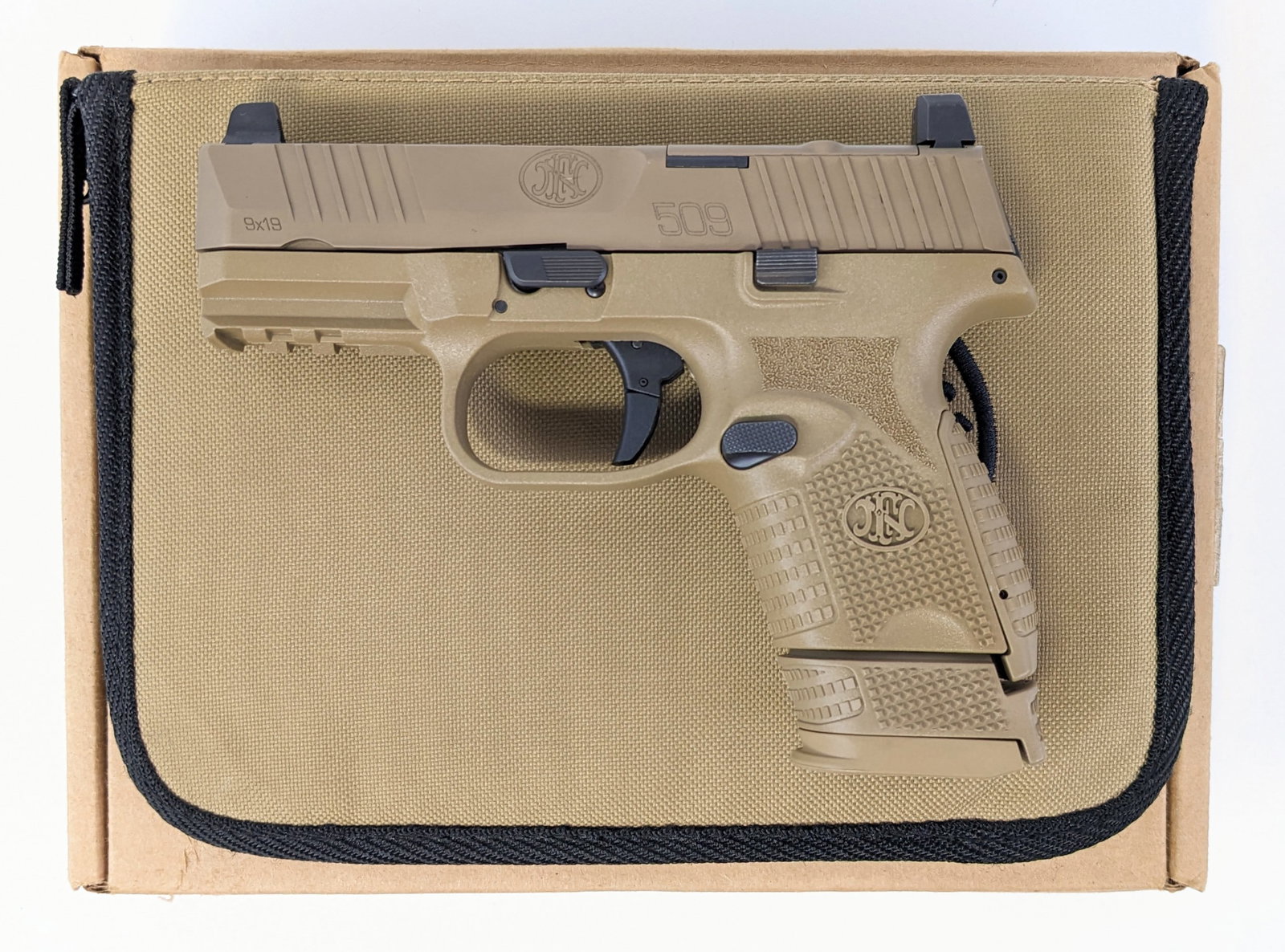 FN Model 509 9mm Compact Semi Auto Pistol: Manufacturer: FN.Model: 509.Type: Pistol. Caliber/Gauge: 9mm. Barrel: 3-1/2 inch. Choke: . Finish: Flat Dark Earth. Grip: Polymer. Stock: . Condition: Very nice with light wear from use and handling. 
