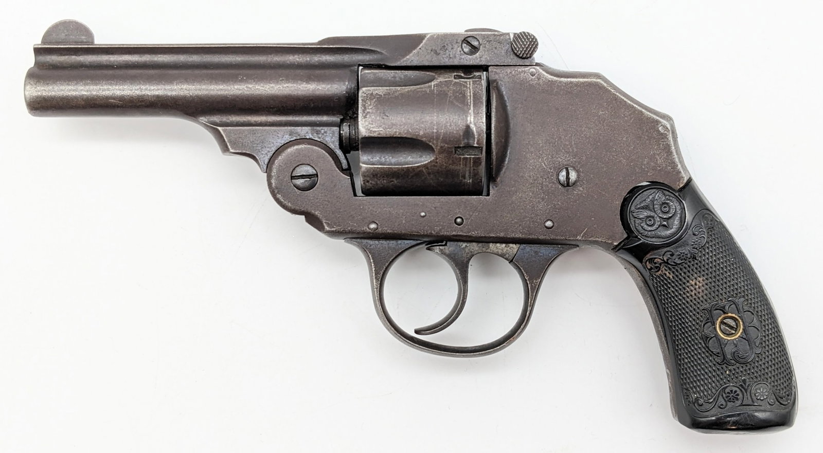 Iver Johnson .32 Cal Top Break Revolver: Manufacturer: Iver Johnson .Model: Top Break.Type: Revolver. Caliber/Gauge: .32 Cal. Barrel: 3-1/4 inch. Choke: . Finish: Worn Blued. Grip: Hard Rubber. Stock: . Condition: Aged with scuffs and heavy 