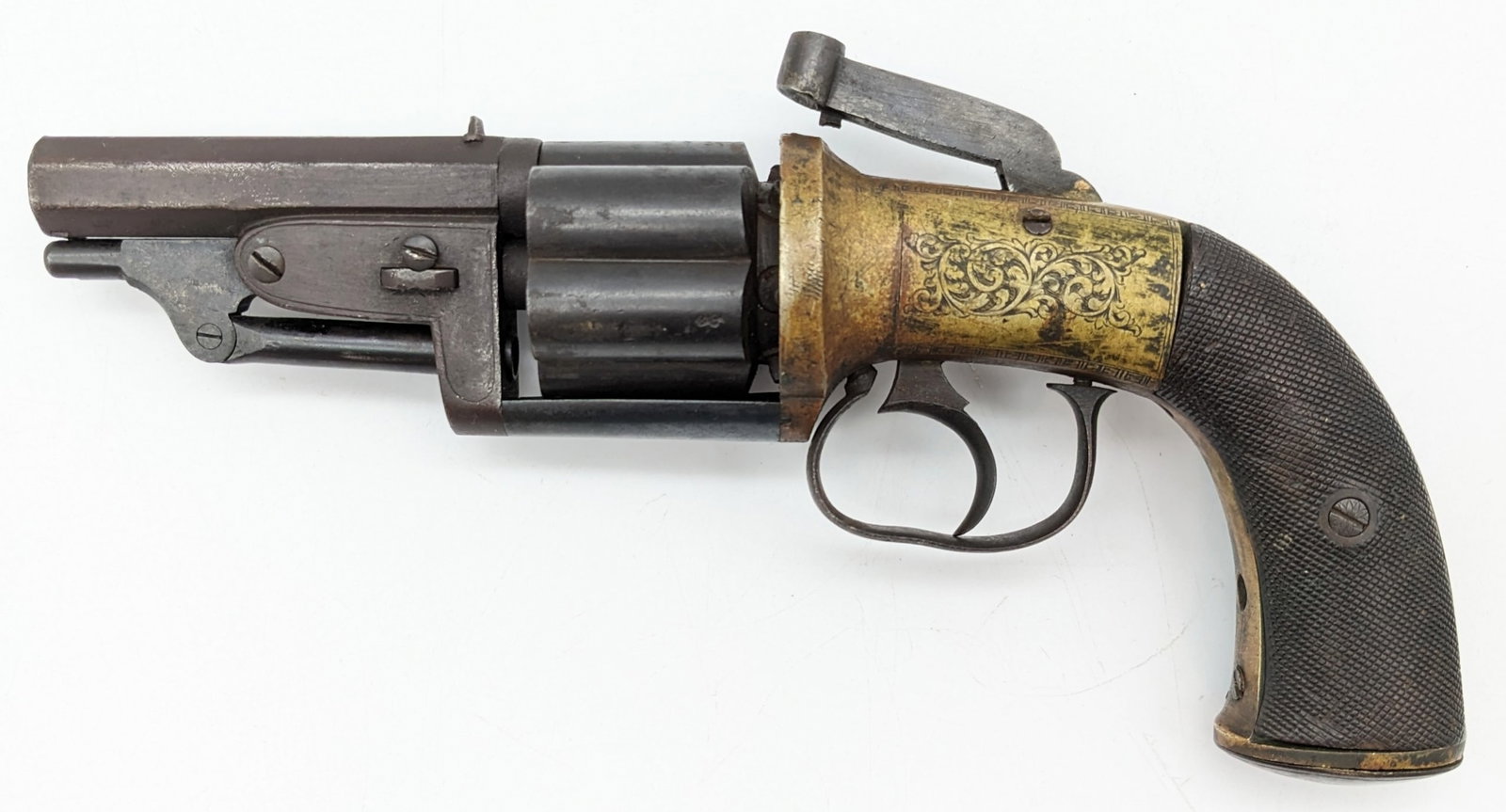 L. Leonard Kells Co. Meath .44 Cal Percussion Revolver: Manufacturer: L. Leonard Kells Co. Meath.Model: .Type: Percussion Revolver. Caliber/Gauge: .44 Cal. Barrel: 3-3/8 inch Octagon . Choke: . Finish: Blued. Grip: Checkered Wood. Stock: . Condition: Aged 