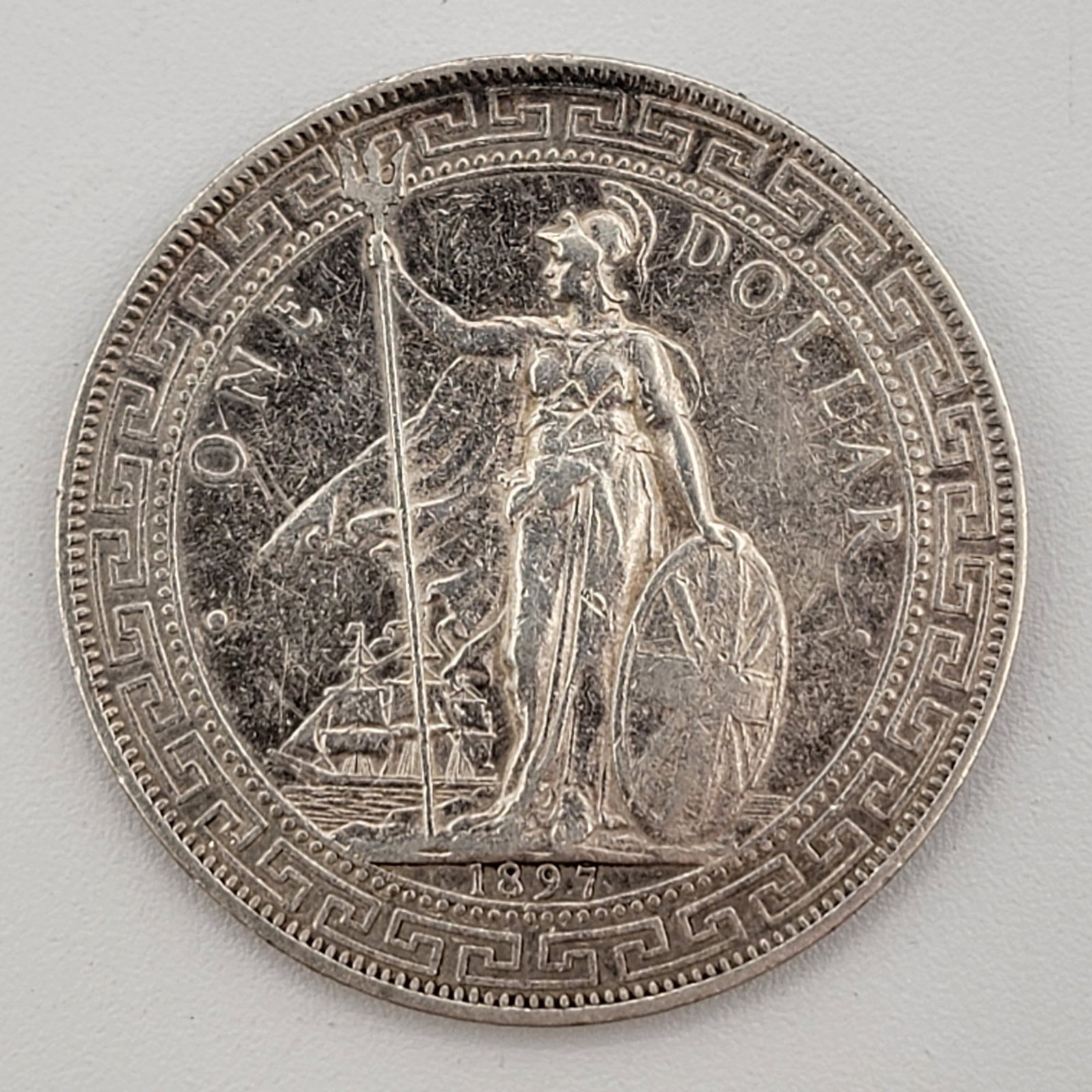 1897 Great Britain Silver Trade Dollar: Nice circulated condition. 90% silver, actual silver weight .78 troy ounce.