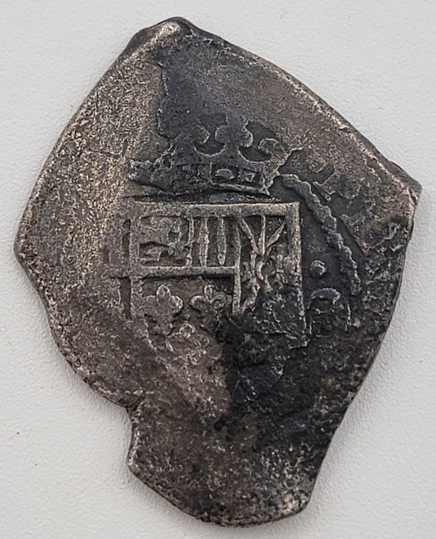 1700's Spanish 8 Reales "Piece Of Eight" Silver Cob Coin Madura Islands Counterstamp: 1700's Spanish 8 Reales "Piece Of Eight" Silver Cob Coin Madura Islands Counterstamp. Weighs 24.51 grams.