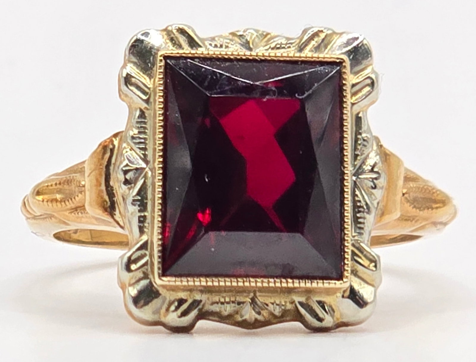 Ladies Vintage 10K Yellow Gold Garnet Dinner Ring: Ladies vintage 10k yellow gold garnet dinner ring. The ring is size 6-3/4 and the total weight is 3.7 grams.