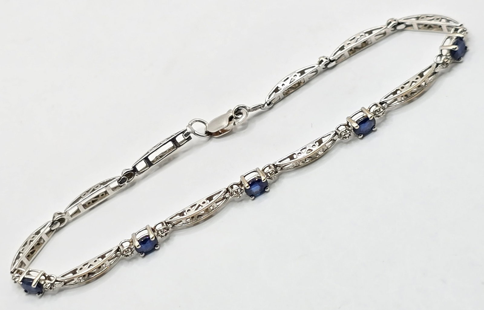 Ladies 10K White Gold Blue Sapphire Bracelet: Ladies 10K White Gold Blue Sapphire Bracelet. The bracelet measures 7-1/2" long and the total weight is 3.55 grams.