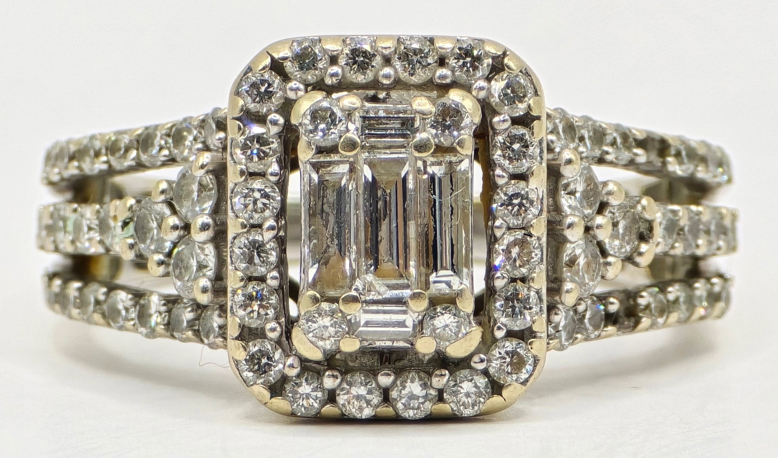 Ladies 14K White Gold Diamond Cluster Statement Ring: Ladies 14K White Gold Genuine Diamond Cluster Statement Ring. The ring is missing two small diamonds on the side. Ring is size 6-3/4 and the total weight is 6.21 grams.
