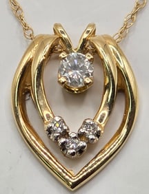 Ladies 14K Yellow Gold Diamond Pendant And Chain
