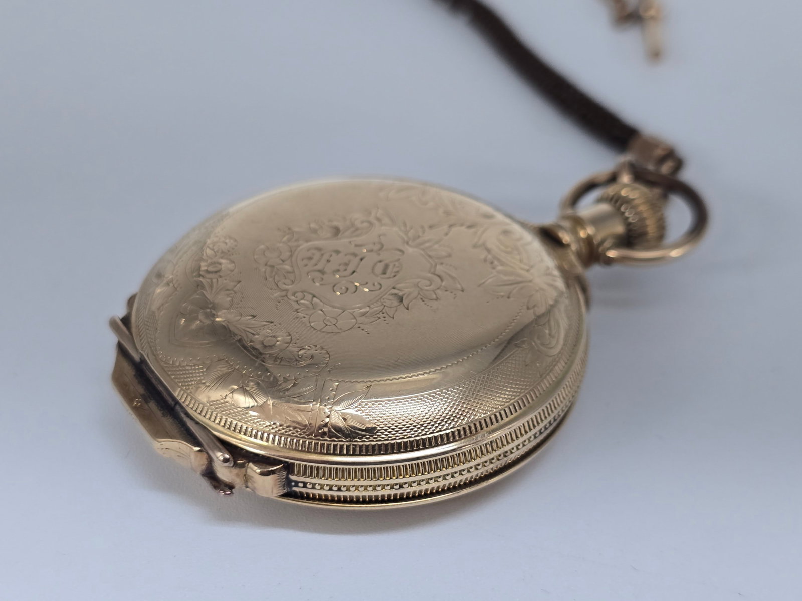 1890 Hampden Model 2 Hunting Case Pocket Watch: 1890 Hampden Model 2 Pocket Watch. The 15 jewel size 18 hunting case watch is in good running condition. Comes in a Dueber 14k gold filled case with monograms on the back, the face is clean. Comes wit