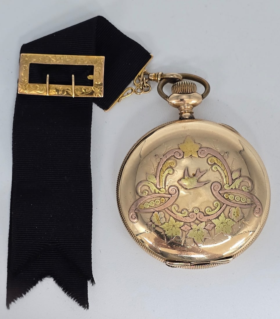1906 Elgin Grade 339 Tri-Color Hunting Case Pocket Watch: 1906 Elgin Grade 339 Pocket Watch. The 17 jewel size 16 hunting case watch is in good running condition. Comes in a Philadelphia Tri-Color gold filled case, the face has some hairlines. Has a gold fil