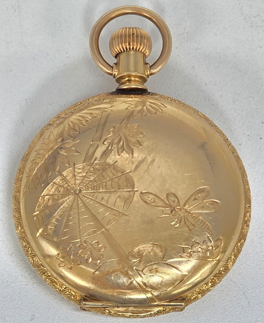 1893 Elgin Grade 117 Hunting Case Pocket Watch: 1893 Elgin Grade 113 Pocket Watch. The 7 jewel size 6 hunting case watch is in not running and needs repair. Comes in a gold filled case with an etched dragon fly and spider web, the face is clean, bu