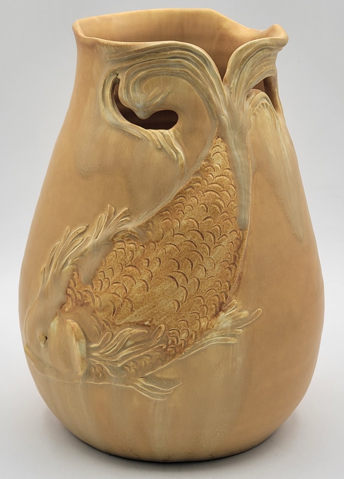 Ephraim Faience Art Pottery Koi Fish Vase: Beautiful Ephraim Faience Art Pottery Vase featuring a Koi Fish. The vase has a matte finish and is in great condition, signed on the base. Measures 9-3/8" tall x 7" across.