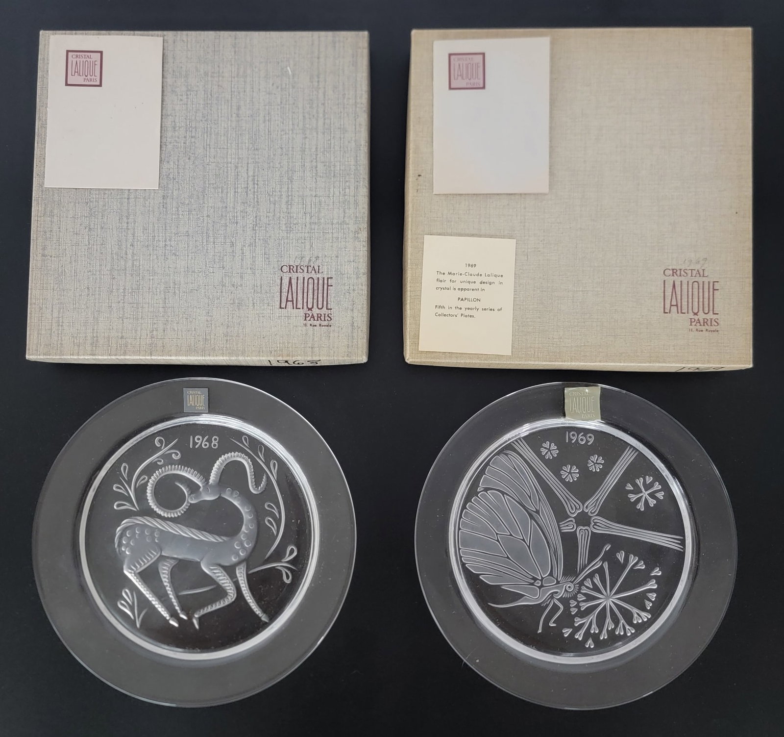 1968 & 1969 Lalique Crystal Annual Plates NIB: New In Box 1968 & 1969 Lalique Crystal Annual Plates. The 1968 is titled "Gazelle Fantasy" and the 1969 is titled "Butterfly". The plates are both signed and measure 8-1/4" in diameter. Designed by Ma
