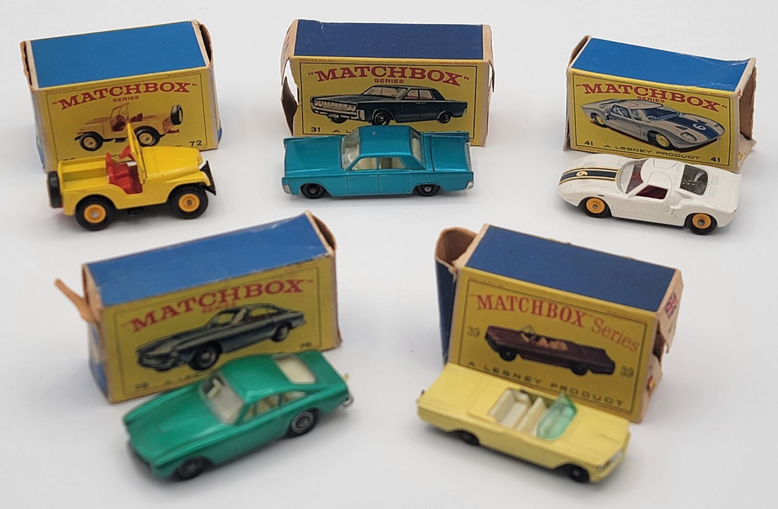 (5) Vintage Lesney Matchbox Vehicles In Original Boxes: (5) Vintage Lesney Matchbox Vehicles In Original Boxes. Lot includes #72 Standard Jeep, #41 Ford G.T. Racer, #75 Ferrari Berlinetta, #39 Pontiac Convertible, & #31 Lincoln Continental. Vehicles are al